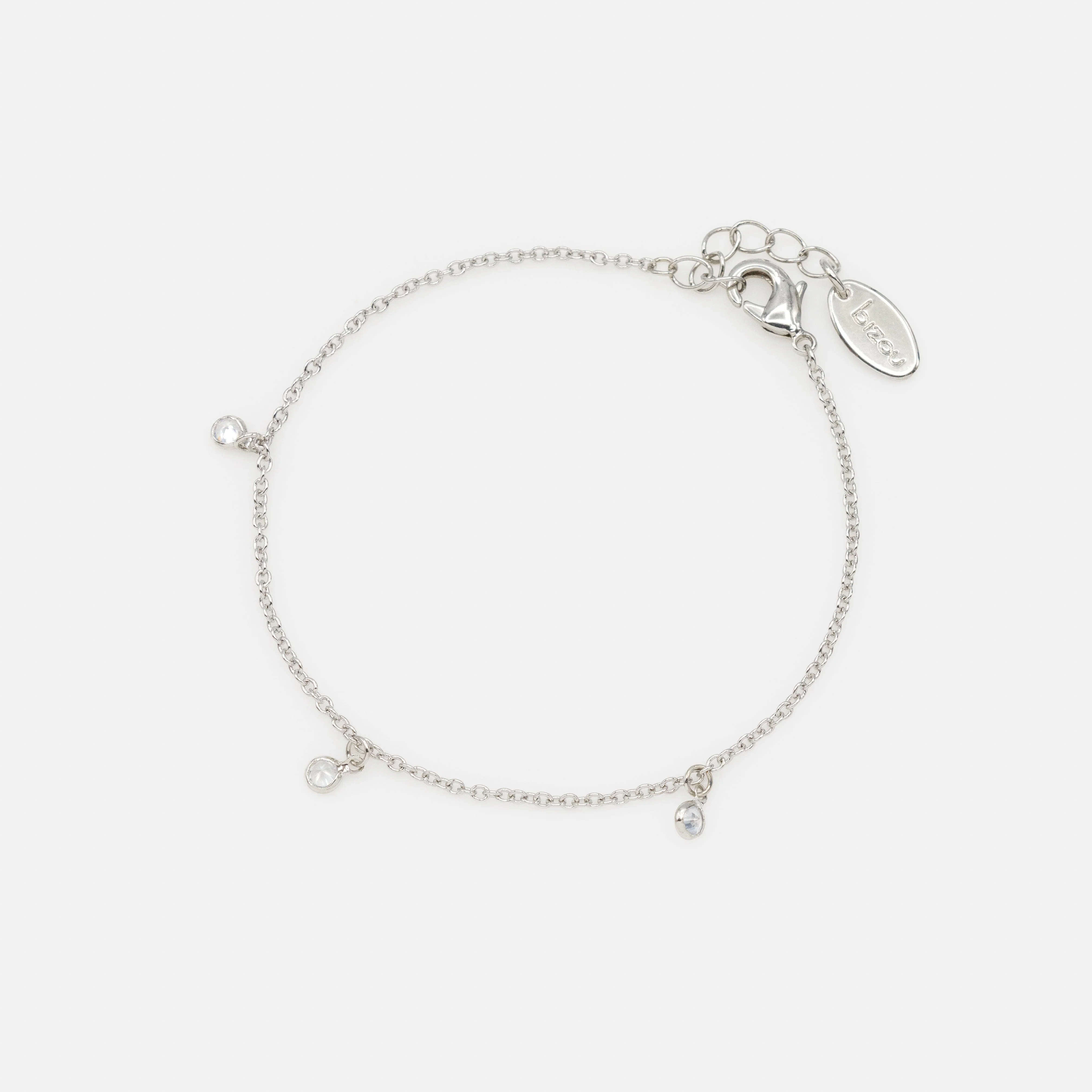 Bracelet argenté petites breloques rondes avec zircons cubiques
